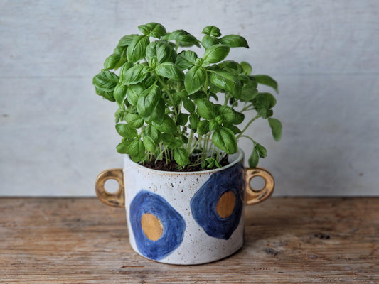 Floral planter with handles