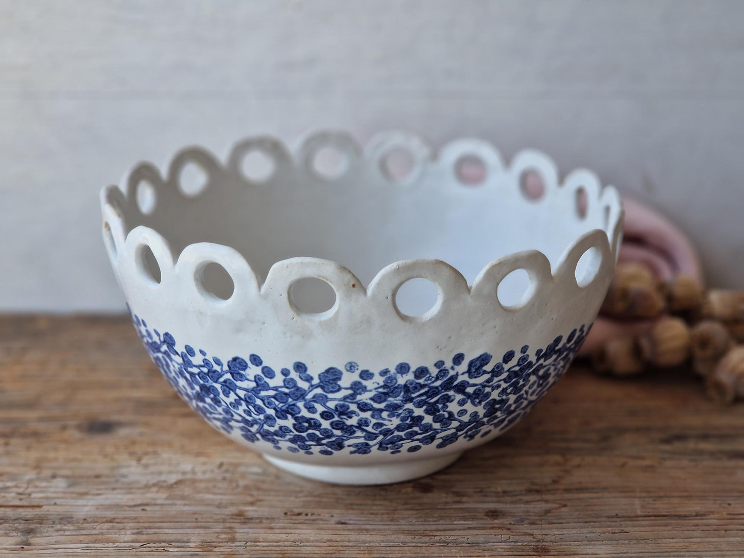 Floral fruit bowl with scalloped rim