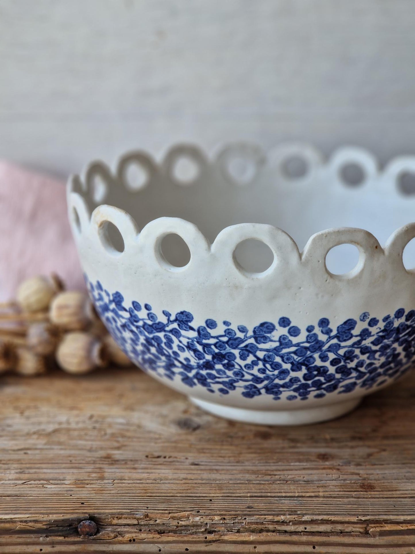 Floral fruit bowl with scalloped rim