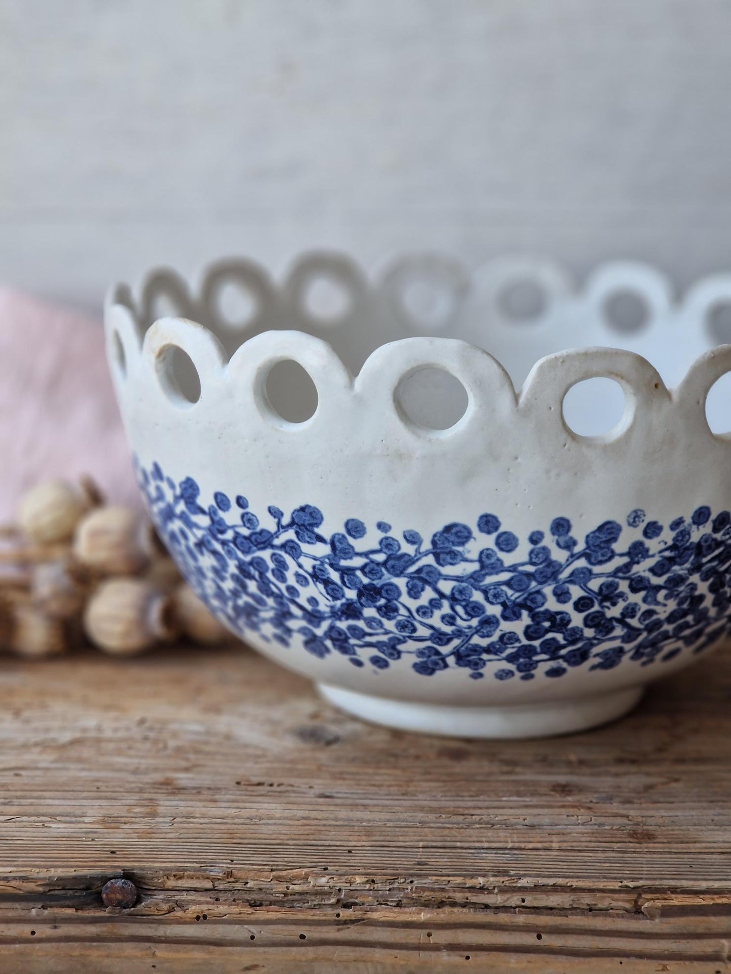 Floral fruit bowl with scalloped rim