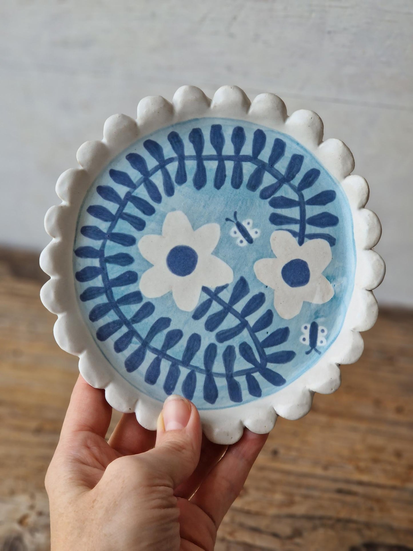 Ceramic wall art / scalloped side plate