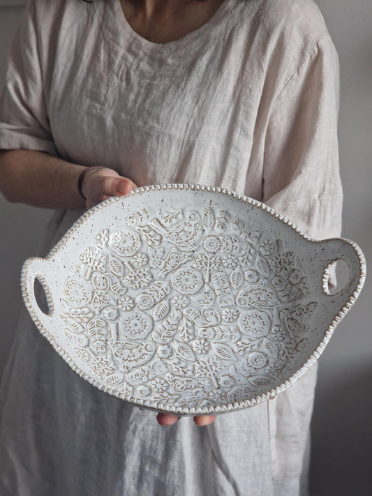 Folk art bowl with handles