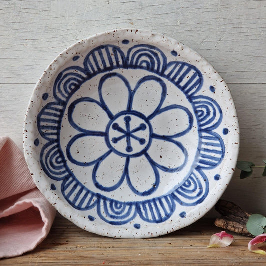 Handmade white ceramic pasta bowl with blue flower