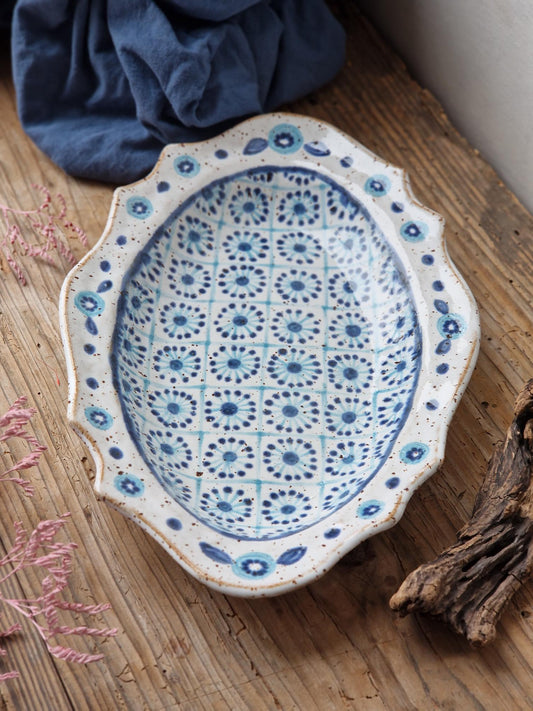 handmade oval ceramic tray with blue geometric pattern