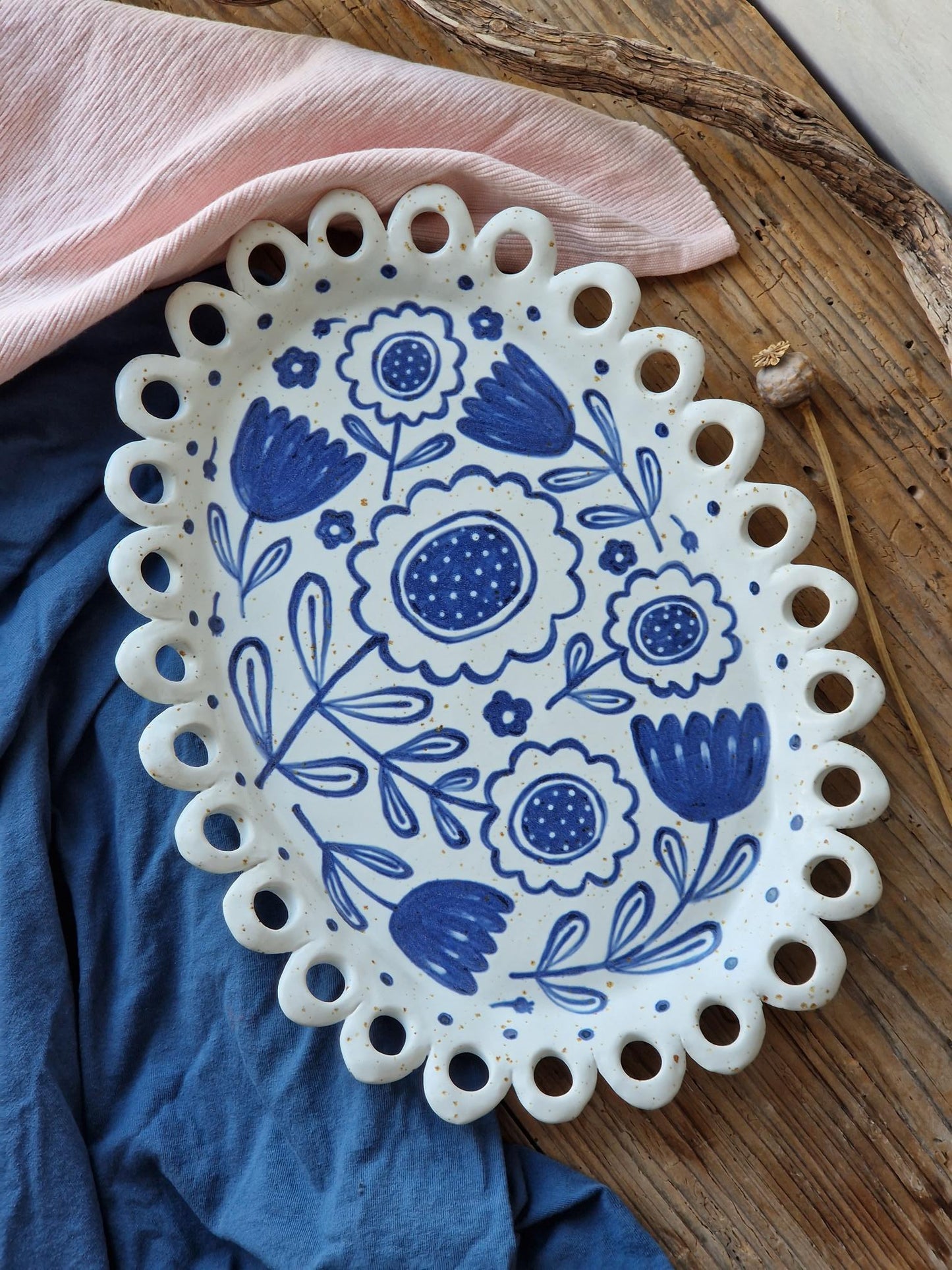 Slightly flawed: Scalloped floral platter