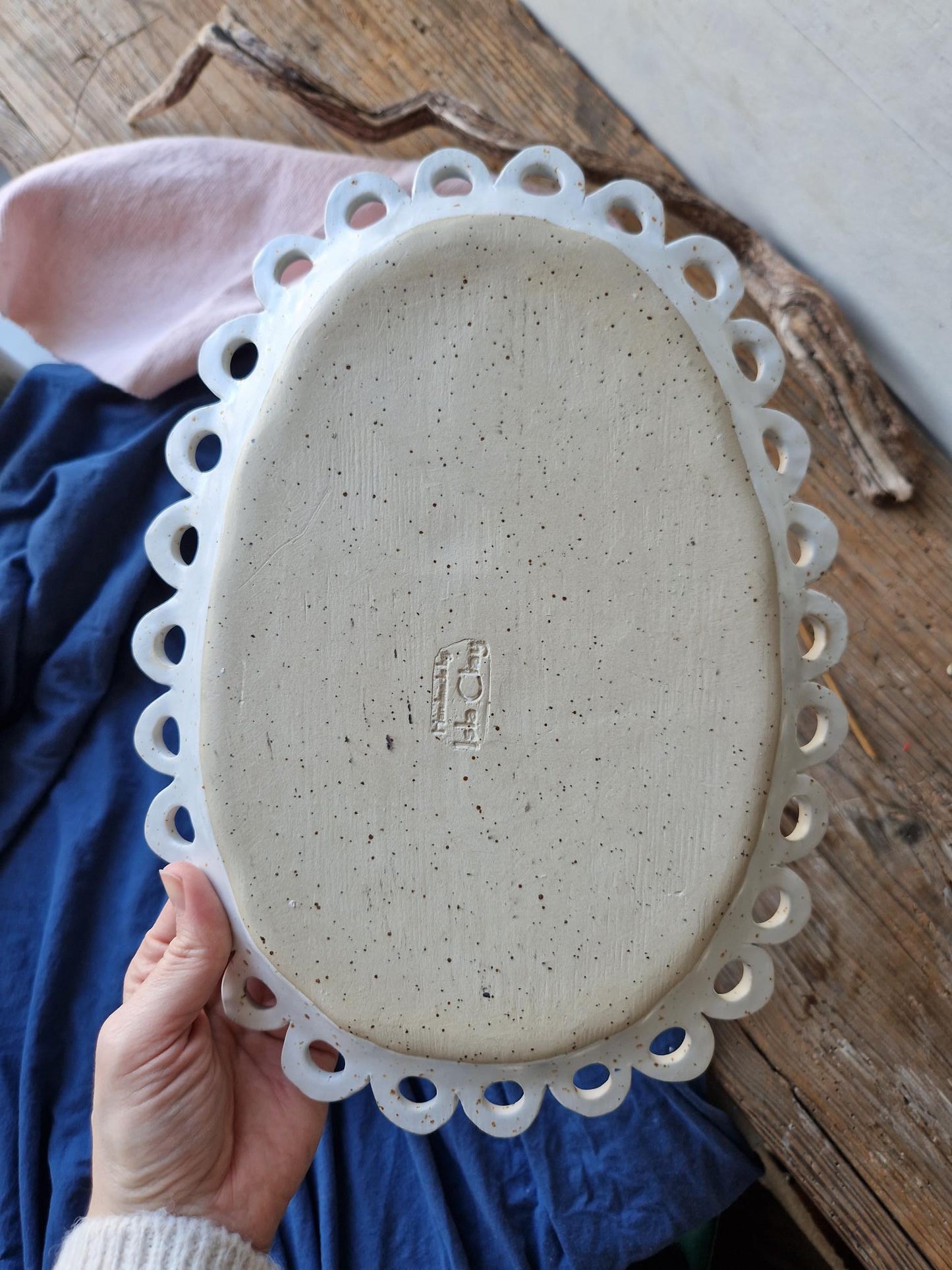 Slightly flawed: Scalloped floral platter