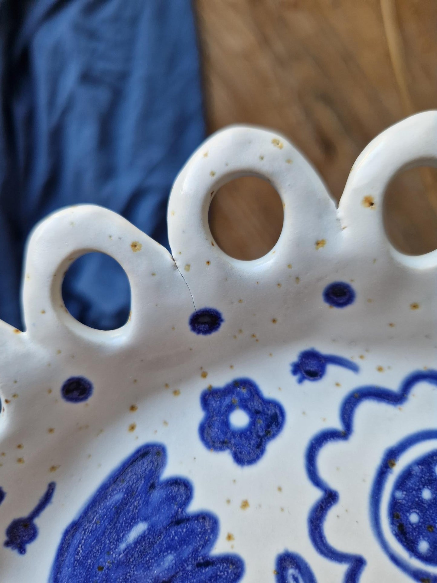 Slightly flawed: Scalloped floral platter