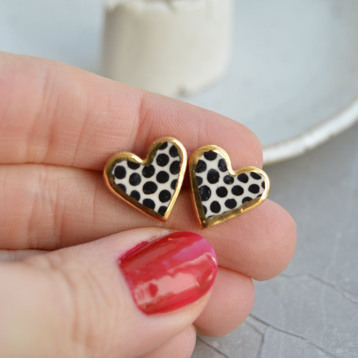 Gold rimmed heart studs