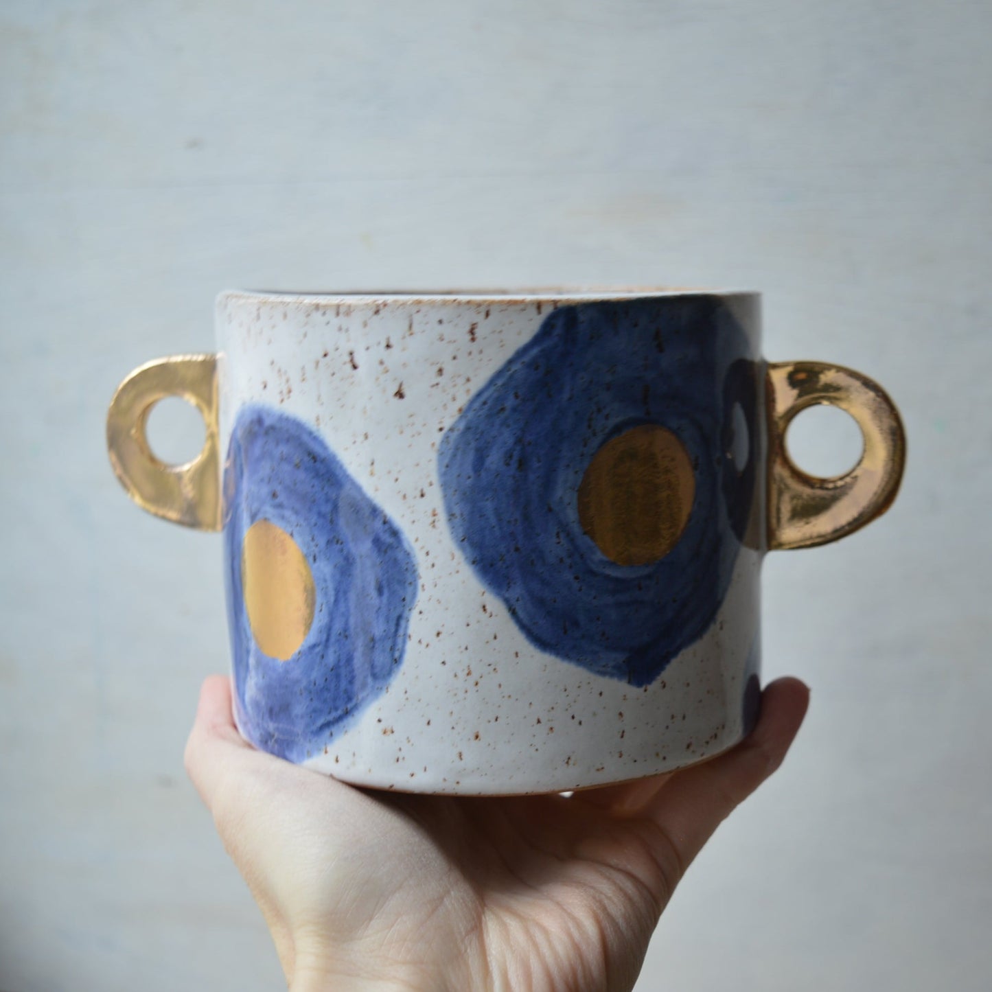 Floral planter with handles
