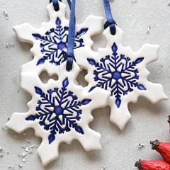 ceramic snowflake christmas decorations in blue and white