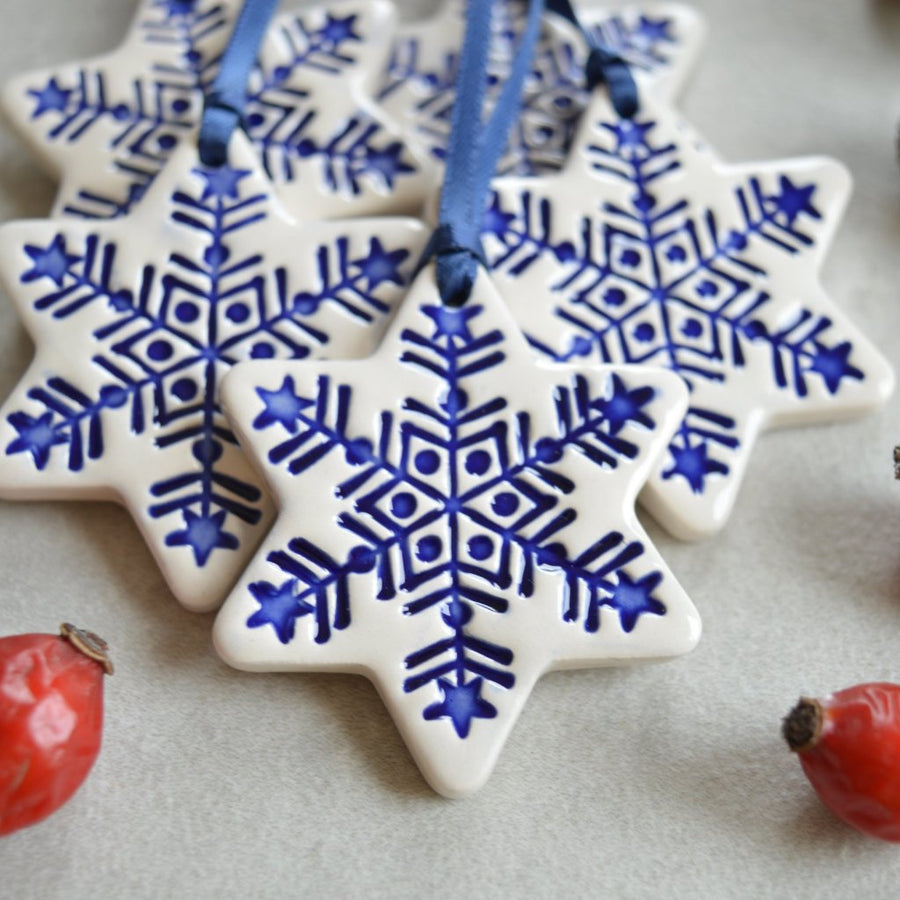 ceramic star christmas ornaments in white and royal blue