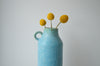 Tall vase with handle