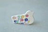 Colourful bird brooches