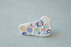 Colourful bird brooches