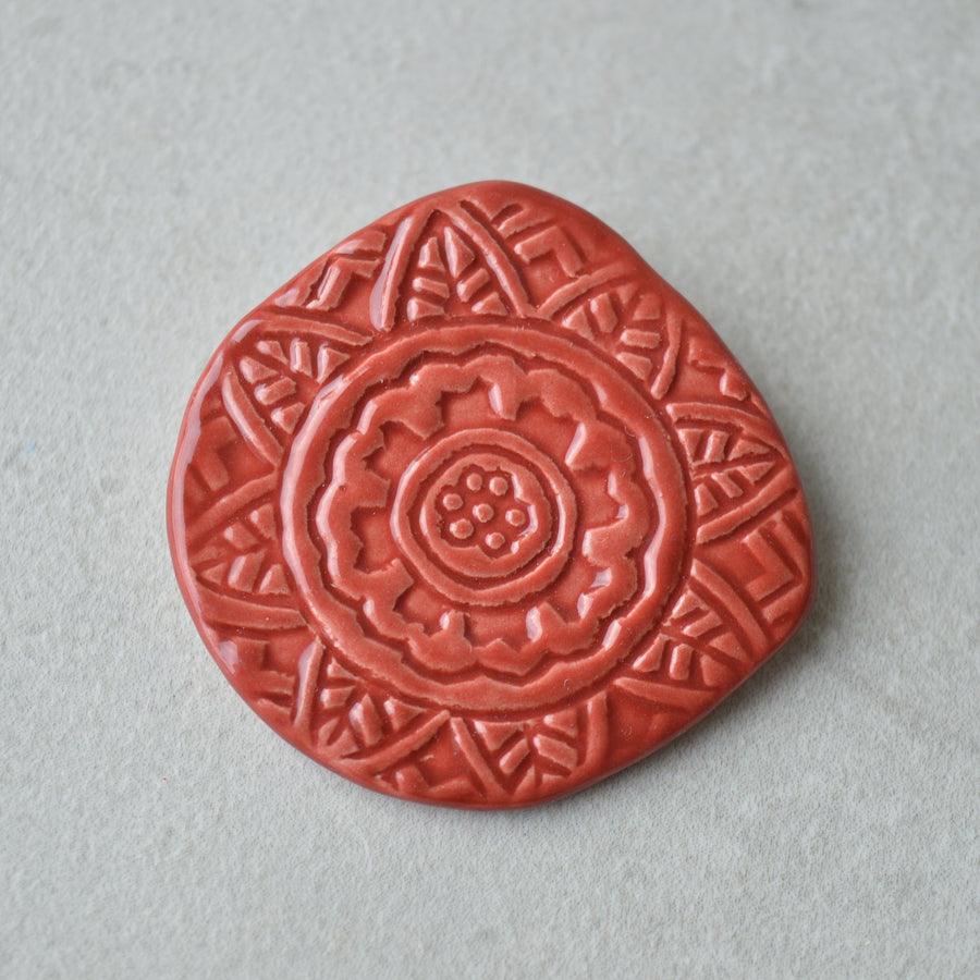 Red textured brooch II