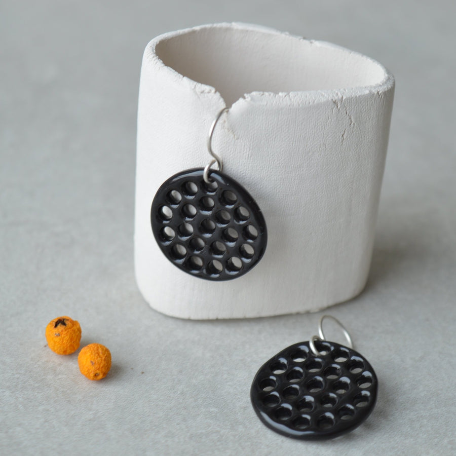Earrings with holes