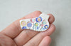 Colourful bird brooches