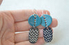 Geometric earrings with holes - teal blue