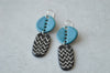 Geometric earrings with holes - teal blue