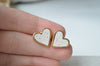 Gold rimmed heart studs