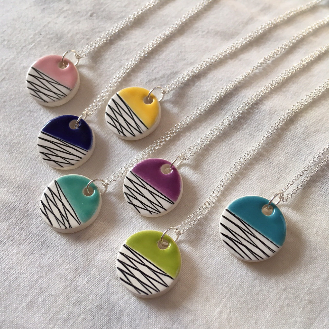 Colourful minimalist geometric ceramic pendants